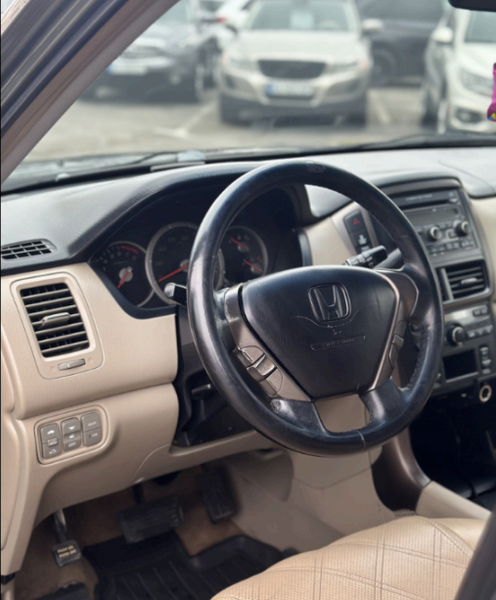 Honda Pilot 2006 I покоління (FL) &bull; 3.5i AT (248 к.с.) AWD &bull; Base Газ пропан-бутан / Бензин С017 фото